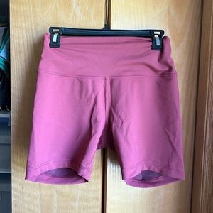 Pink Lululemon bike shorts